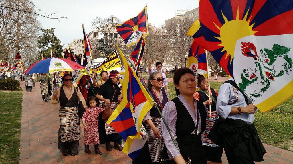 Washington-DC Tibetans and Tibet supporters arrive at Lafayette Park in Washington DC, following a march from the Chinese embassy.