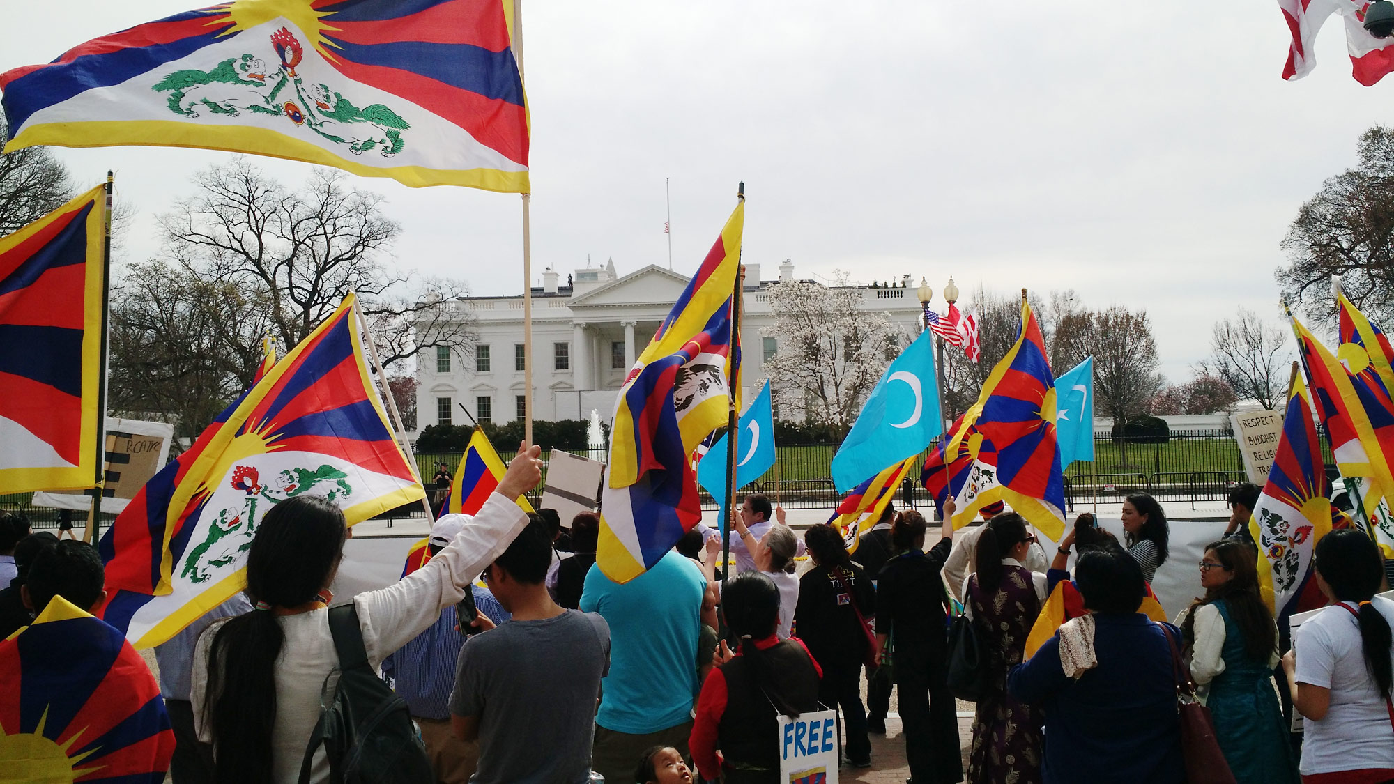 Washington-DC Tibetan, Uyghur, and Chinese demonstrators in front of the White House in Washington, DC.